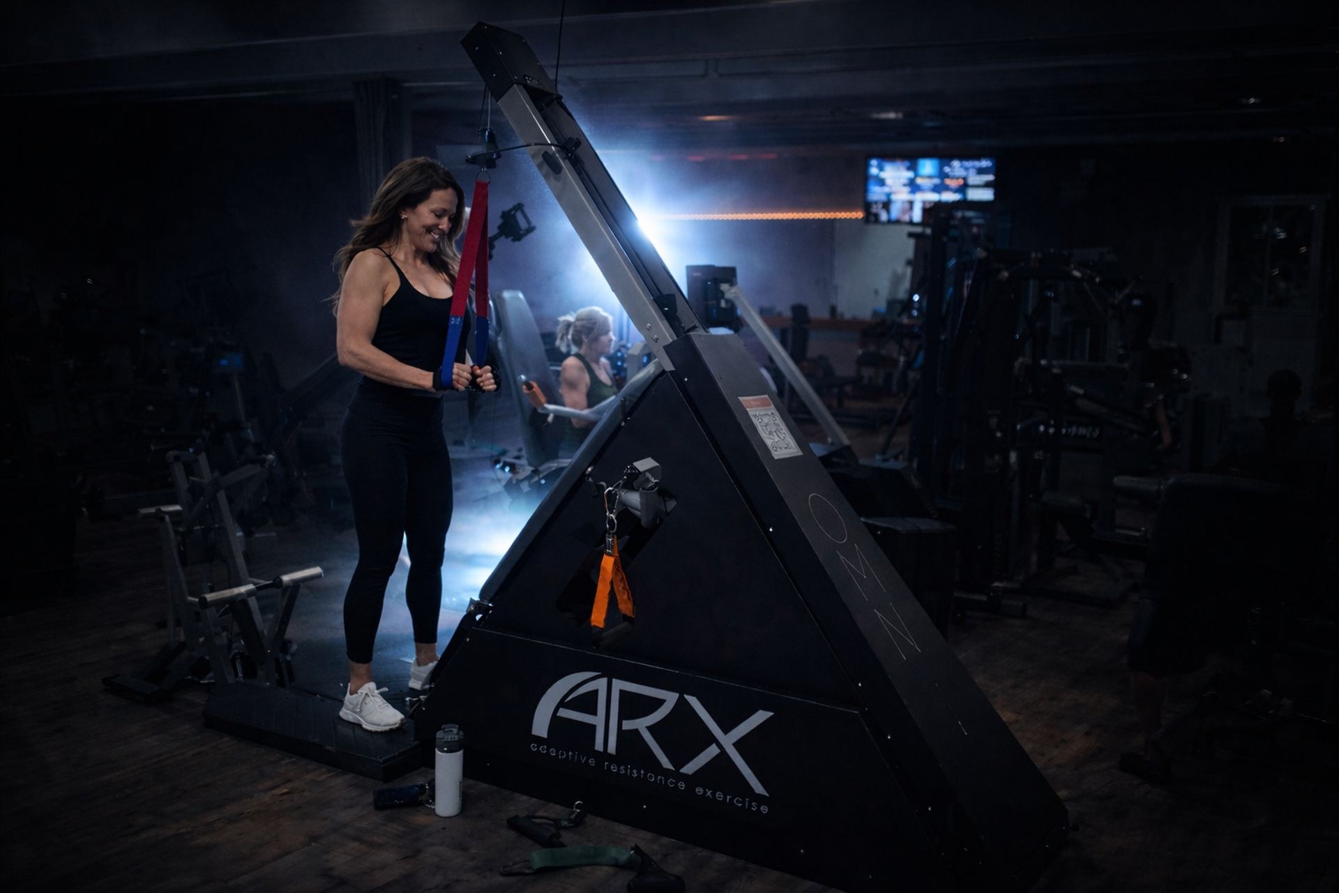 Client performing triceps exercise on ARX Alpha at KalQlate Science Hendersonville TN